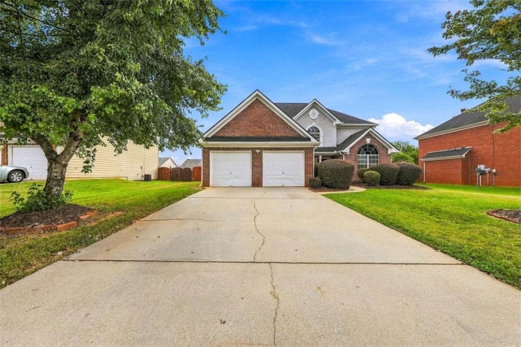 4 bedroom, 3 bathroom, 2,713 sq ft single family residence for sale at 1202 Polk Crossing, Mcdonough, GA 30252 — photo 2