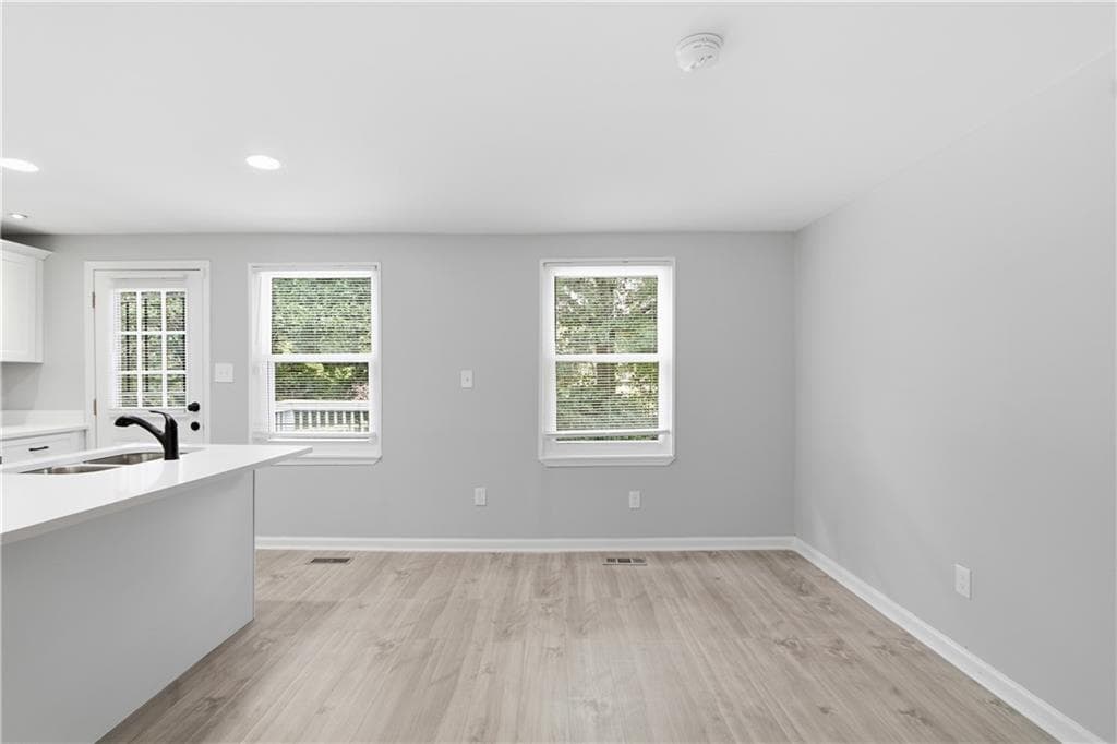 4 bedroom, 2 bathroom, 1,718 sq ft single family residence for sale at 3724 Bramblevine Circle, Lithonia, GA 30038 — photo 4