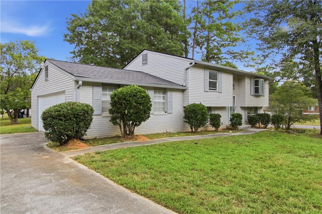 4 bedroom, 2 bathroom, 1,718 sq ft single family residence for sale at 3724 Bramblevine Circle, Lithonia, GA 30038 — photo 6