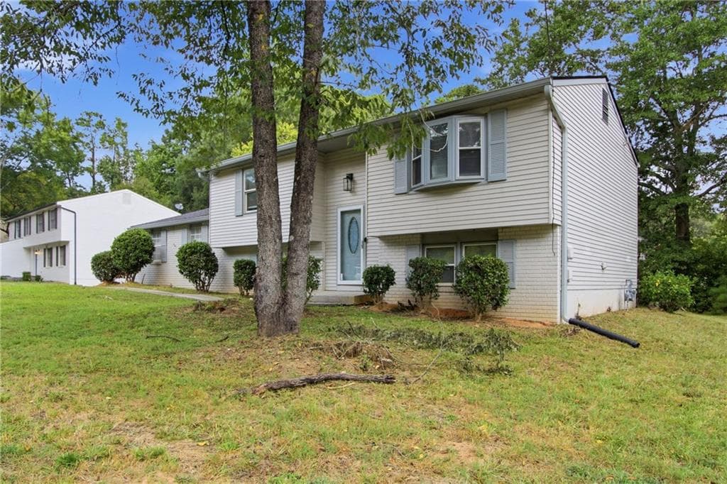 4 bedroom, 2 bathroom, 1,718 sq ft single family residence for sale at 3724 Bramblevine Circle, Lithonia, GA 30038 — photo 7