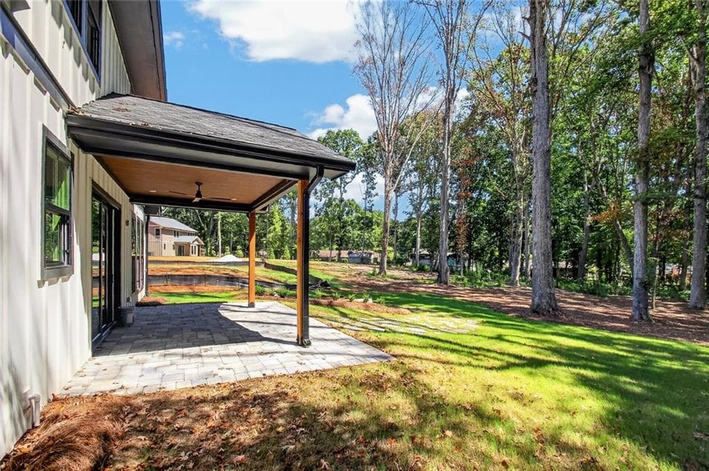 4 bedroom, 5 bathroom, 4,900 sq ft single family residence for sale at 5578 Lilburn Stone Mountain Road, Stone Mountain, GA 30087 — photo 6