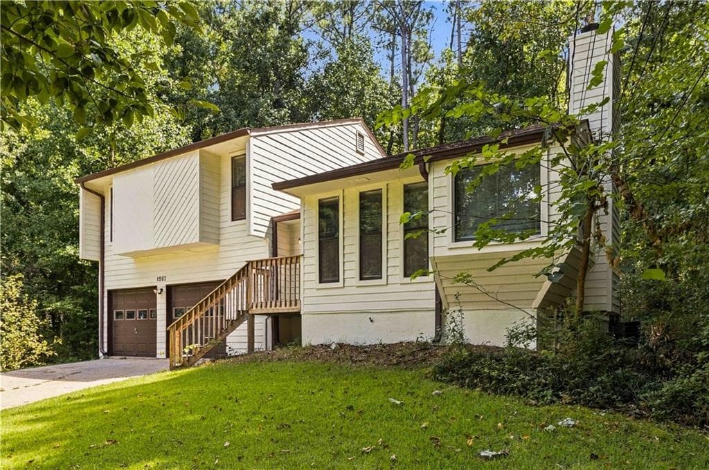 3 bedroom, 2 bathroom, 2,399 sq ft single family residence for sale at 1967 Kelvin Drive, Lawrenceville, GA 30043 — photo 2