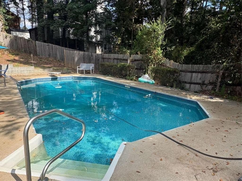 4 bedroom, 3 bathroom, 1,992 sq ft single family residence for sale at 1068 Leslie Place, Lithonia, GA 30058 — photo 4
