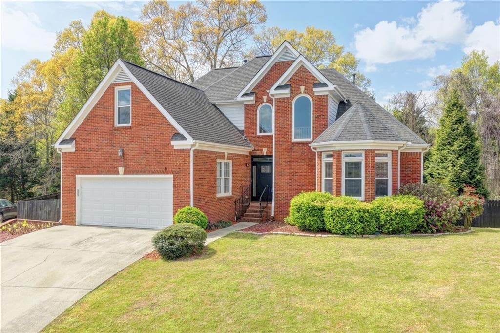 5 bedroom, 4 bathroom, 5,025 sq ft single family residence for sale at 1005 Lewis Ridge Circle, Lawrenceville, GA 30045 — photo 2