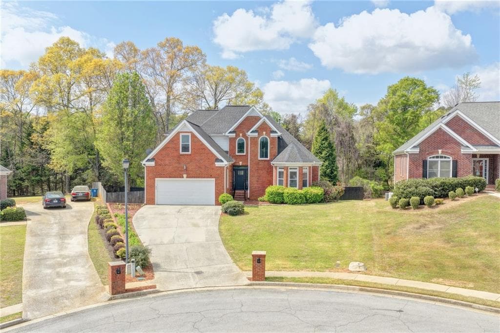 5 bedroom, 4 bathroom, 5,025 sq ft single family residence for sale at 1005 Lewis Ridge Circle, Lawrenceville, GA 30045 — photo 3