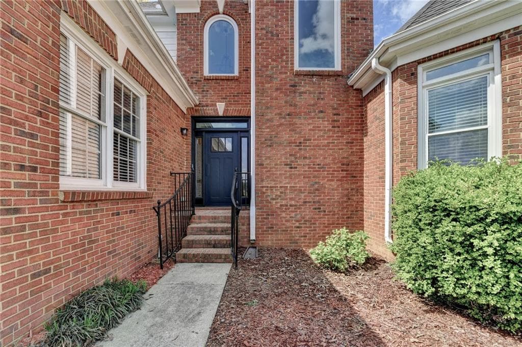 5 bedroom, 4 bathroom, 5,025 sq ft single family residence for sale at 1005 Lewis Ridge Circle, Lawrenceville, GA 30045 — photo 4