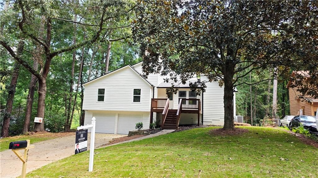 5 bedroom, 3 bathroom, 2,060 sq ft single family residence for sale at 4610 Kings Crossing Drive, Kennesaw, GA 30144 — photo 2
