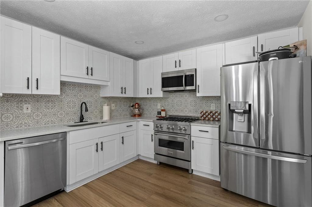 5 bedroom, 3 bathroom, 2,452 sq ft single family residence for sale at 2608 Abbotts Glen Drive, Acworth, GA 30101 — photo 6