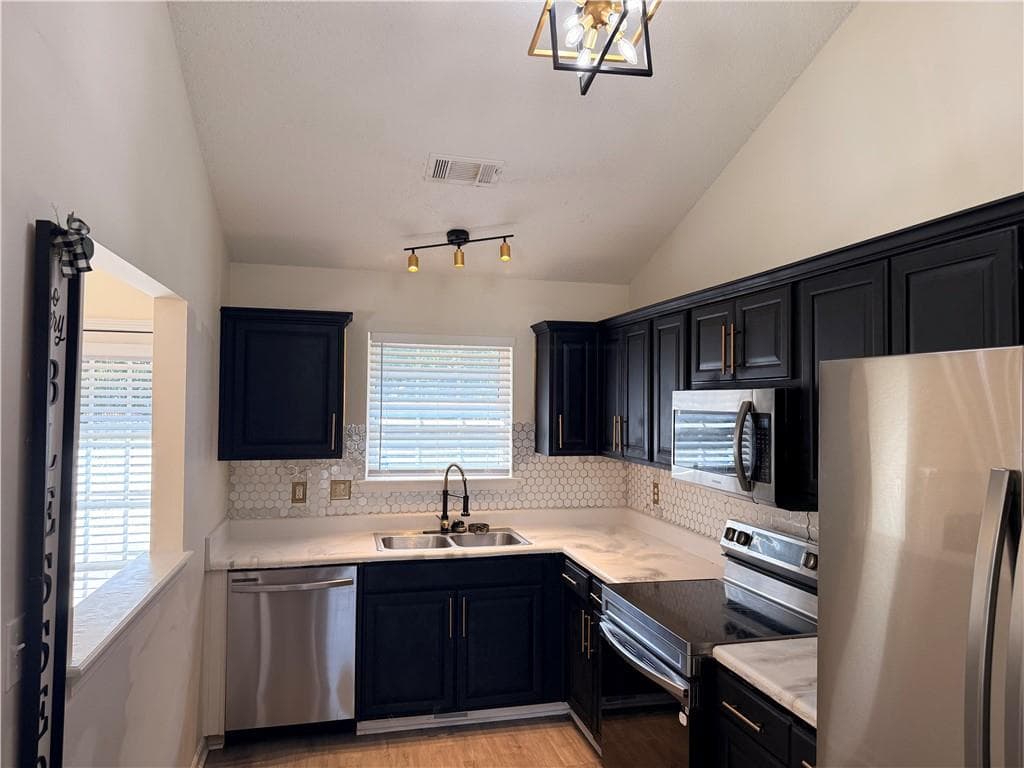 5 bedroom, 3 bathroom, 2,004 sq ft single family residence for sale at 5867 Amerson Lane, Ellenwood, GA 30294 — photo 4