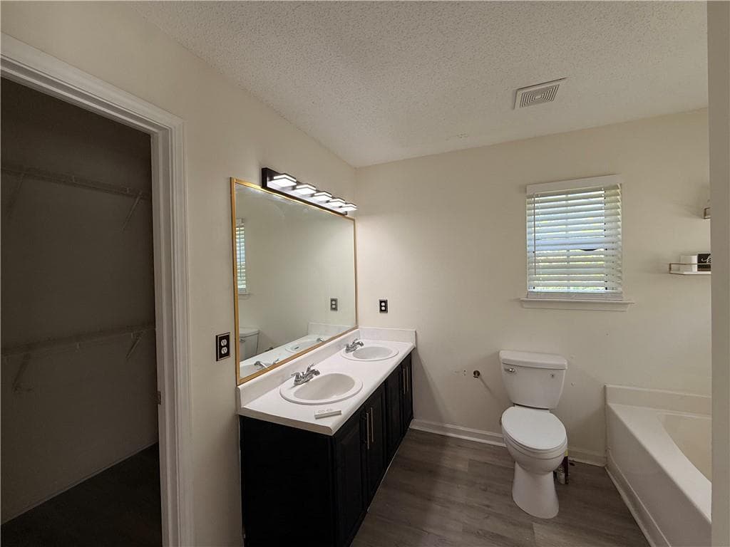 5 bedroom, 3 bathroom, 2,004 sq ft single family residence for sale at 5867 Amerson Lane, Ellenwood, GA 30294 — photo 9