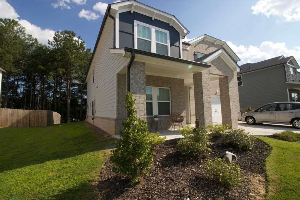 5 bedroom, 5 bathroom, 3,321 sq ft single family residence for sale at 4211 Dean Grove Way, Loganville, GA 30052 — photo 2