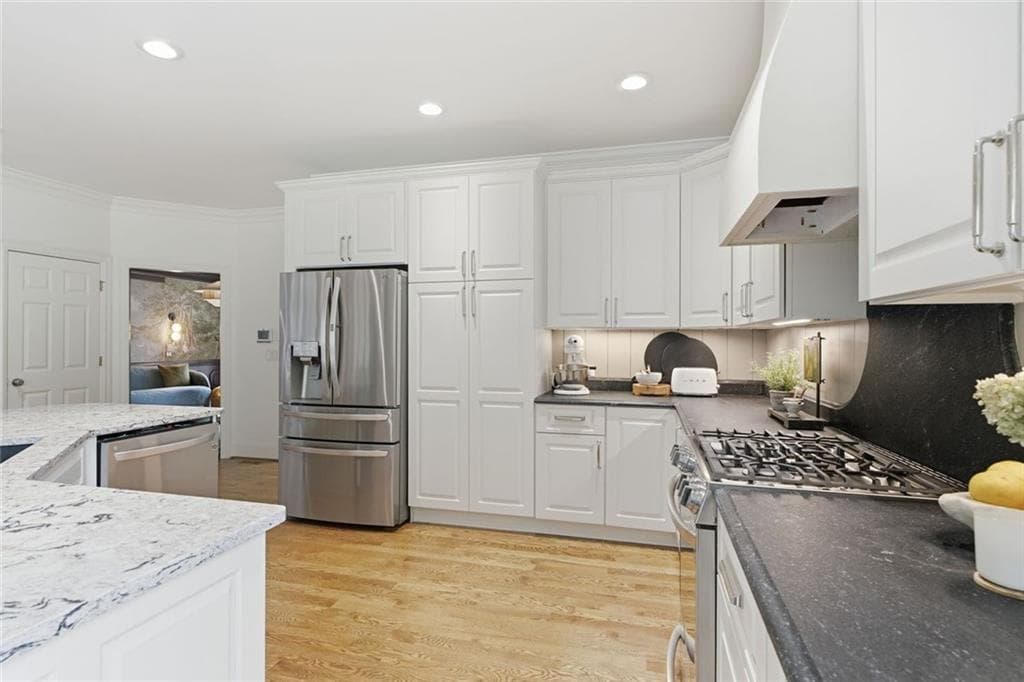 5 bedroom, 5 bathroom, 6,743 sq ft single family residence under contract at 8365 Hurakan Creek Crossing, Cumming, GA 30028 — photo 10