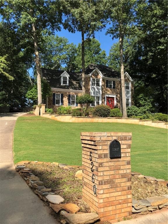 4 bedroom, 3 bathroom, 5,000 sq ft single family residence for sale at 5260 Overbend Trail, Suwanee, GA 30024 — photo 2
