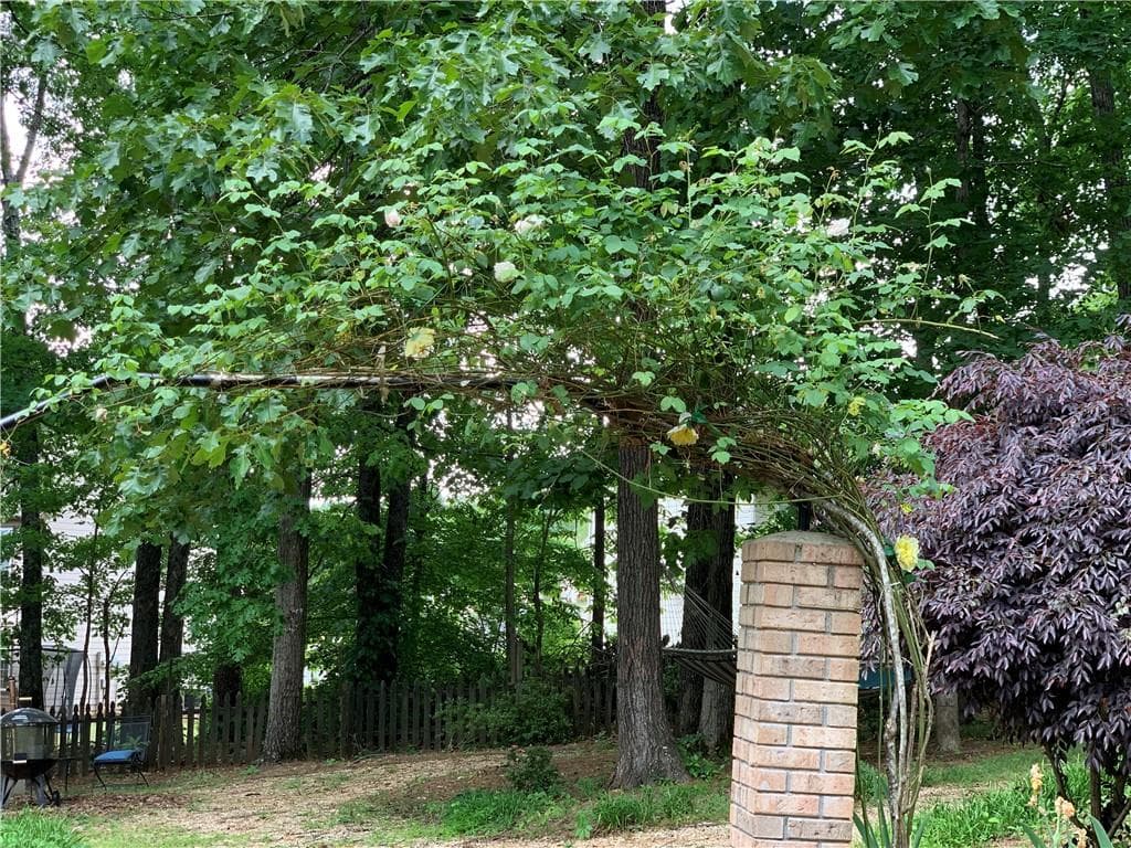 4 bedroom, 3 bathroom, 5,000 sq ft single family residence for sale at 5260 Overbend Trail, Suwanee, GA 30024 — photo 10