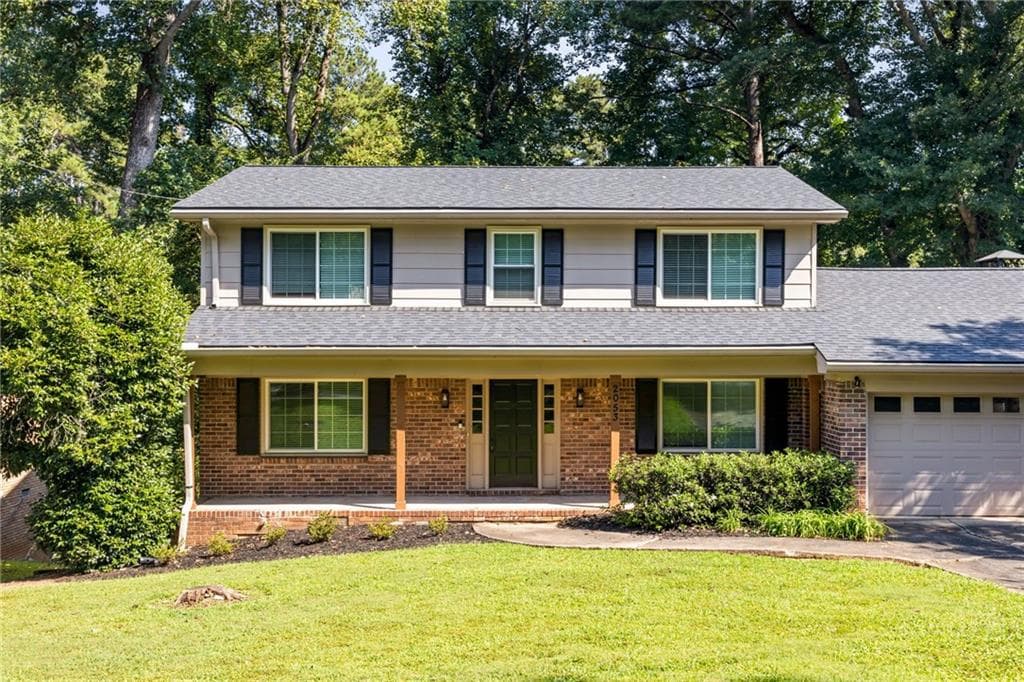 4 bedroom, 3 bathroom, 2,352 sq ft single family residence for sale at 2053 Carthage Road, Tucker, GA 30084 — photo 2
