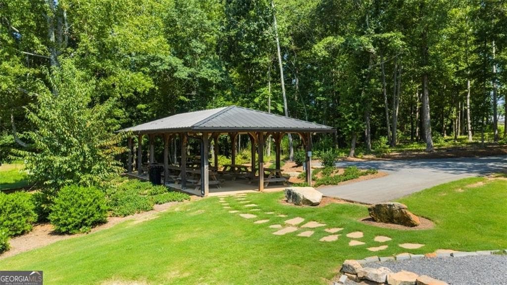4 bedroom, 3 bathroom, 2,338 sq ft single family residence for sale at 22 Canyon Ferry Way, Hoschton, GA 30548 — photo 6