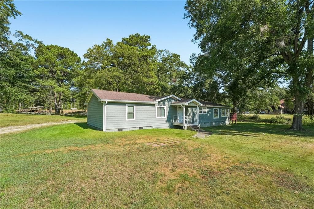 3 bedroom, 2 bathroom, 1,628 sq ft single family residence for sale at 718 Panola Road, Ellenwood, GA 30294 — photo 2