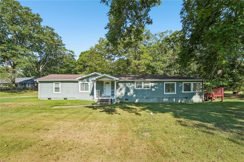 3 bedroom, 2 bathroom, 1,628 sq ft single family residence for sale at 718 Panola Road, Ellenwood, GA 30294 — photo 3