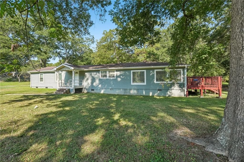 3 bedroom, 2 bathroom, 1,628 sq ft single family residence for sale at 718 Panola Road, Ellenwood, GA 30294 — photo 4