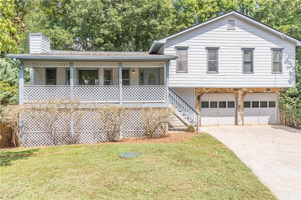3 bedroom, 2 bathroom, 2,130 sq ft single family residence for sale at 311 NATALIE Drive, Lawrenceville, GA 30043 — photo 2