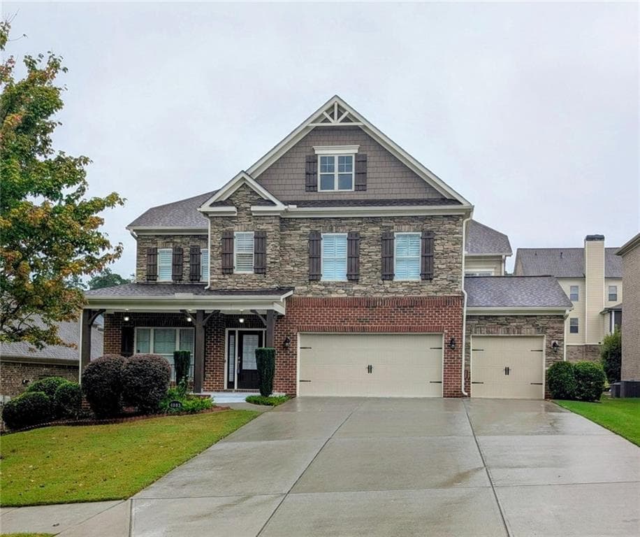 4 bedroom, 4 bathroom, 4,168 sq ft single family residence for sale at 4083 Roberts Crest Drive, Suwanee, GA 30024