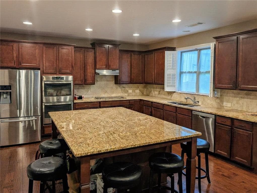 4 bedroom, 4 bathroom, 4,168 sq ft single family residence for sale at 4083 Roberts Crest Drive, Suwanee, GA 30024 — photo 3