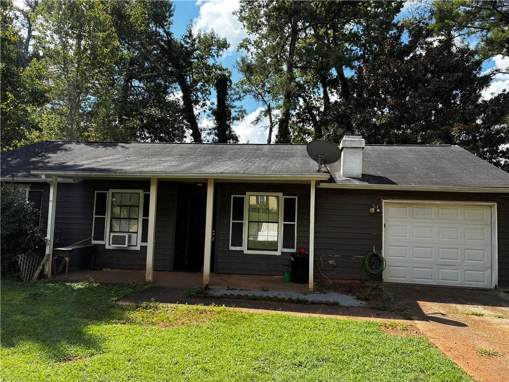 3 bedroom, 2 bathroom, 1,229 sq ft single family residence for sale at 3901 Wood Path Drive, Stone Mountain, GA 30083 — photo 2