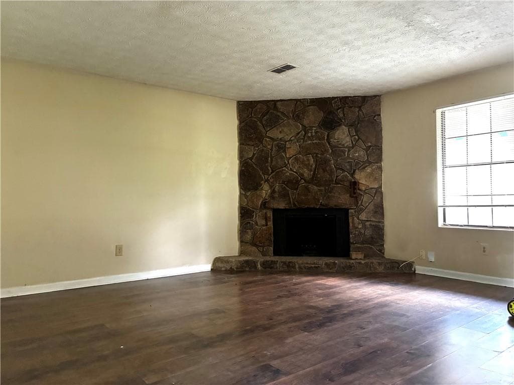 3 bedroom, 2 bathroom, 1,229 sq ft single family residence for sale at 3901 Wood Path Drive, Stone Mountain, GA 30083 — photo 4