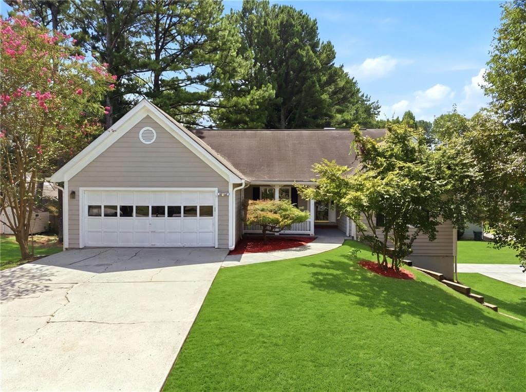 6 bedroom, 3 bathroom, 3,362 sq ft single family residence for sale at 2343 Condor Drive, Lawrenceville, GA 30044 — photo 2
