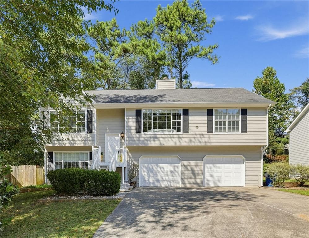 4 bedroom, 3 bathroom, 1,985 sq ft single family residence for sale at 2734 Ashbury Point Lane, Marietta, GA 30066 — photo 2