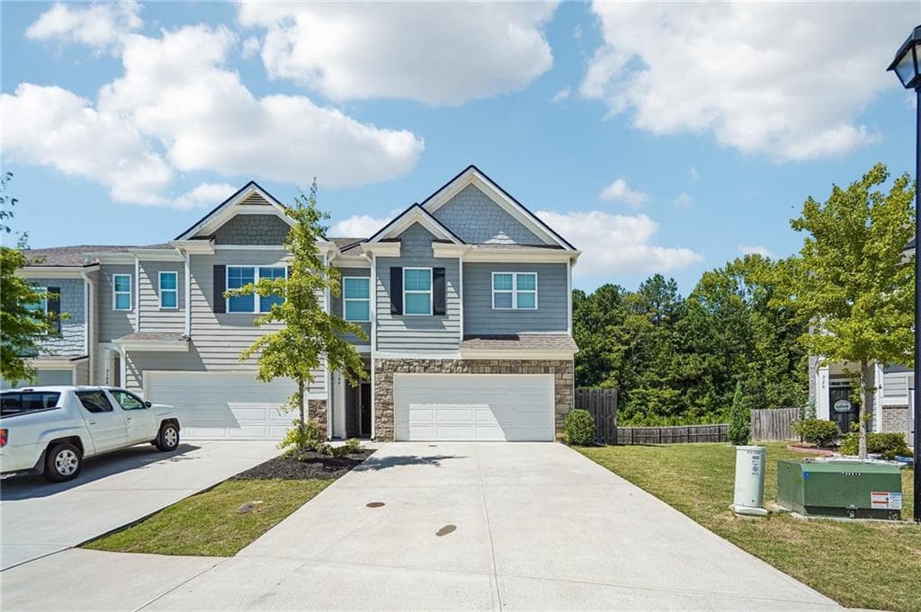 4 bedroom, 3 bathroom, 1,910 sq ft townhouse for sale at 5184 Barberry Avenue, Oakwood, GA 30566