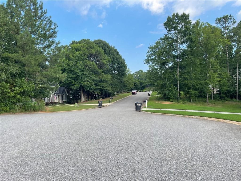 4 bedroom, 3 bathroom, 2,512 sq ft single family residence for sale at 180 Smokey Ridge Drive, Newnan, GA 30263 — photo 2