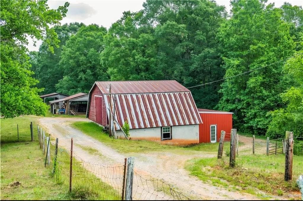 4 bedroom, 4 bathroom, 3,170 sq ft single family residence for rent at 3806 Ball Ground Road, Ball Ground, GA 30107 for $5,250 a month — photo 3