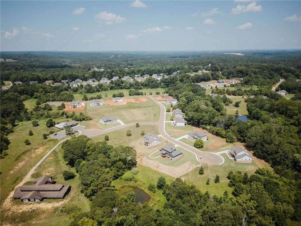 5 bedroom, 4 bathroom, 3,712 sq ft single family residence for sale at 377 Races Road, Hoschton, GA 30548 — photo 5