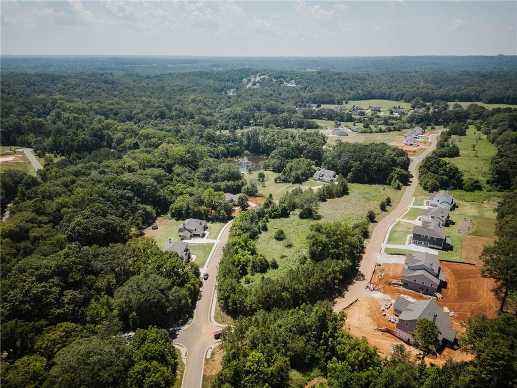 5 bedroom, 4 bathroom, 3,712 sq ft single family residence for sale at 377 Races Road, Hoschton, GA 30548 — photo 6