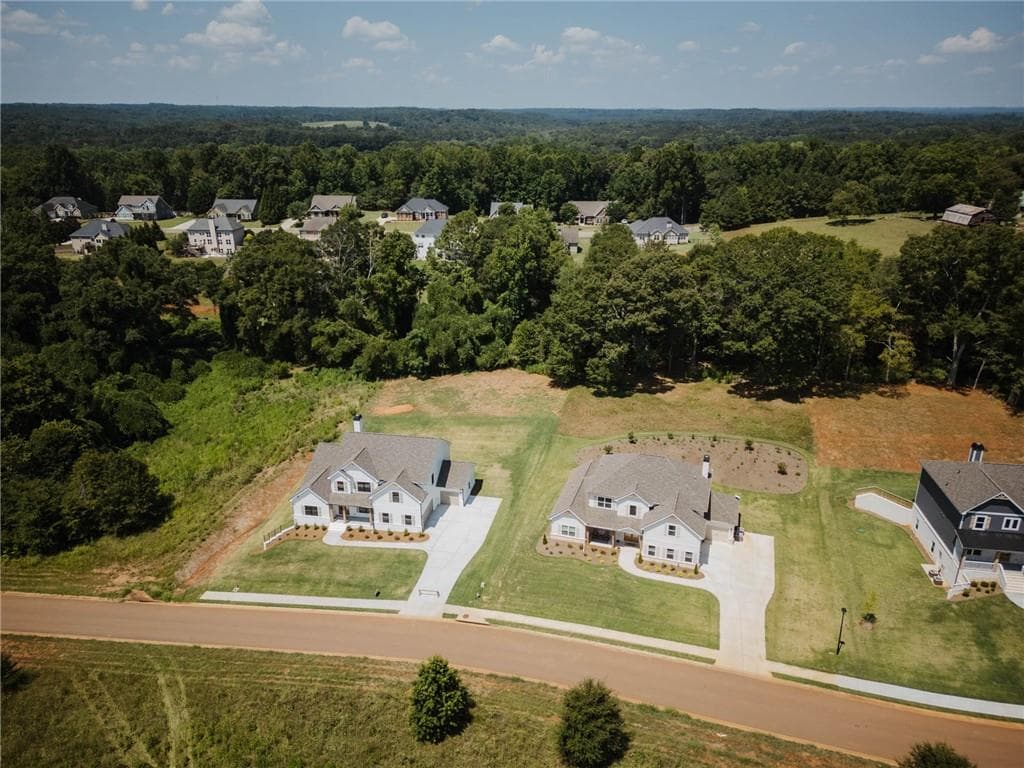 5 bedroom, 4 bathroom, 3,712 sq ft single family residence for sale at 377 Races Road, Hoschton, GA 30548 — photo 7