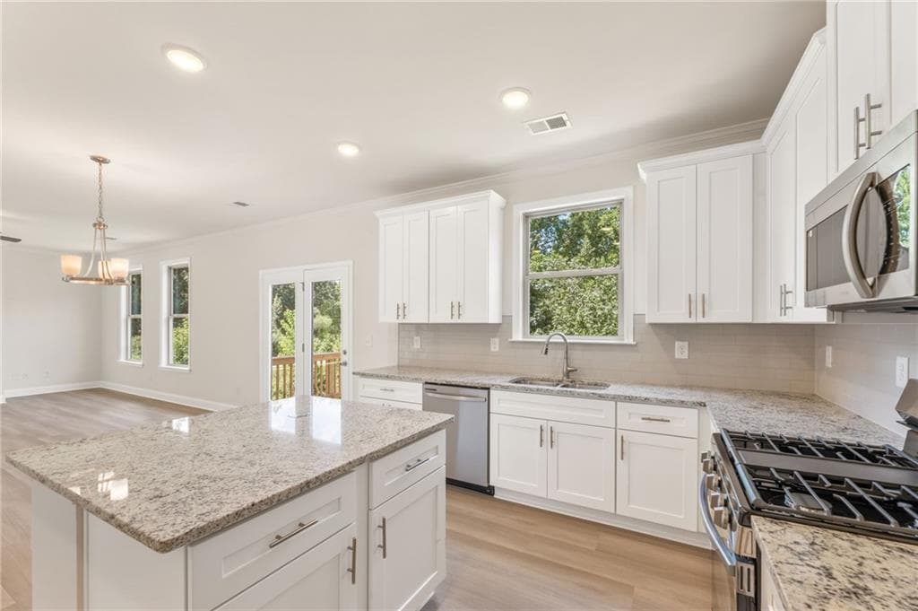 4 bedroom, 3 bathroom single family residence for sale at 127 Open Waters Walk, Braselton, GA 30517 — photo 8