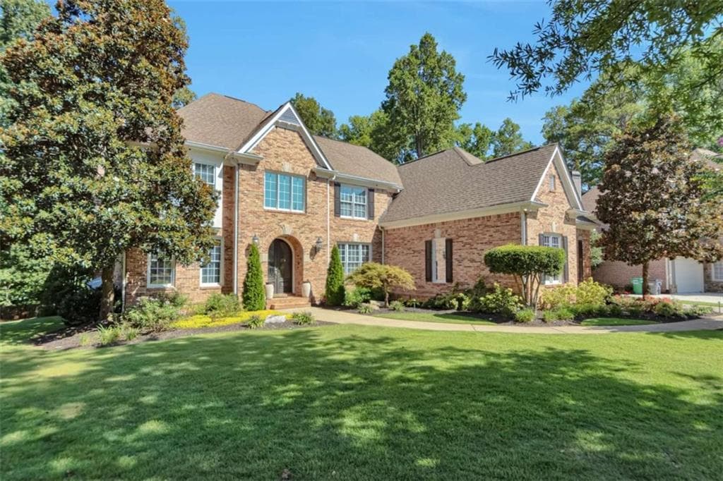 6 bedroom, 6 bathroom, 5,469 sq ft single family residence for sale at 1421 Castlebrooke Way, Marietta, GA 30066 — photo 2