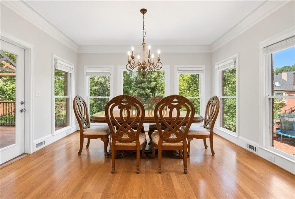 7 bedroom, 6 bathroom, 6,402 sq ft single family residence for sale at 1352 Innsfail Court, Snellville, GA 30078 — photo 4