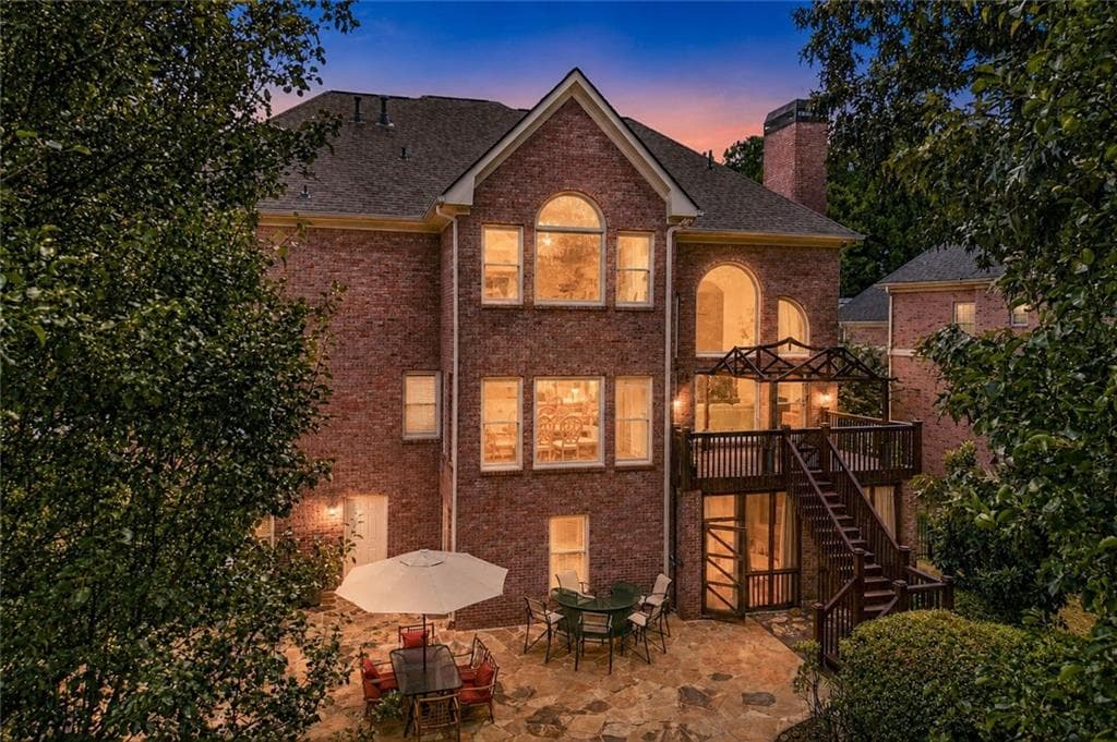 7 bedroom, 6 bathroom, 6,402 sq ft single family residence for sale at 1352 Innsfail Court, Snellville, GA 30078 — photo 10