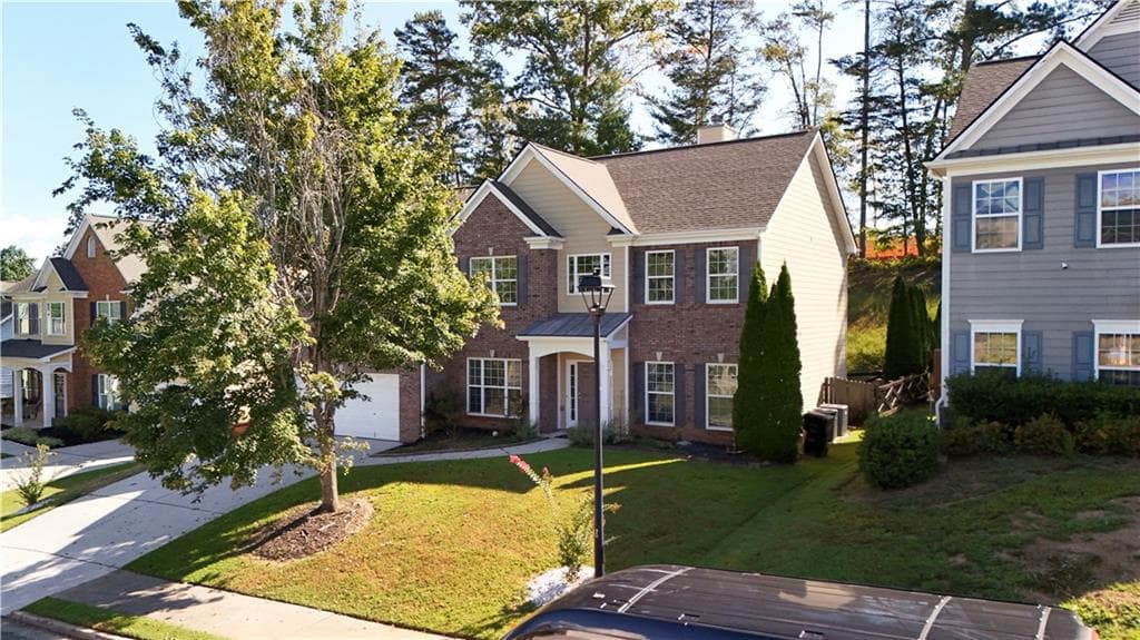 5 bedroom, 3 bathroom, 3,008 sq ft single family residence for sale at 180 Mill Stone Drive, Dawsonville, GA 30534 — photo 2