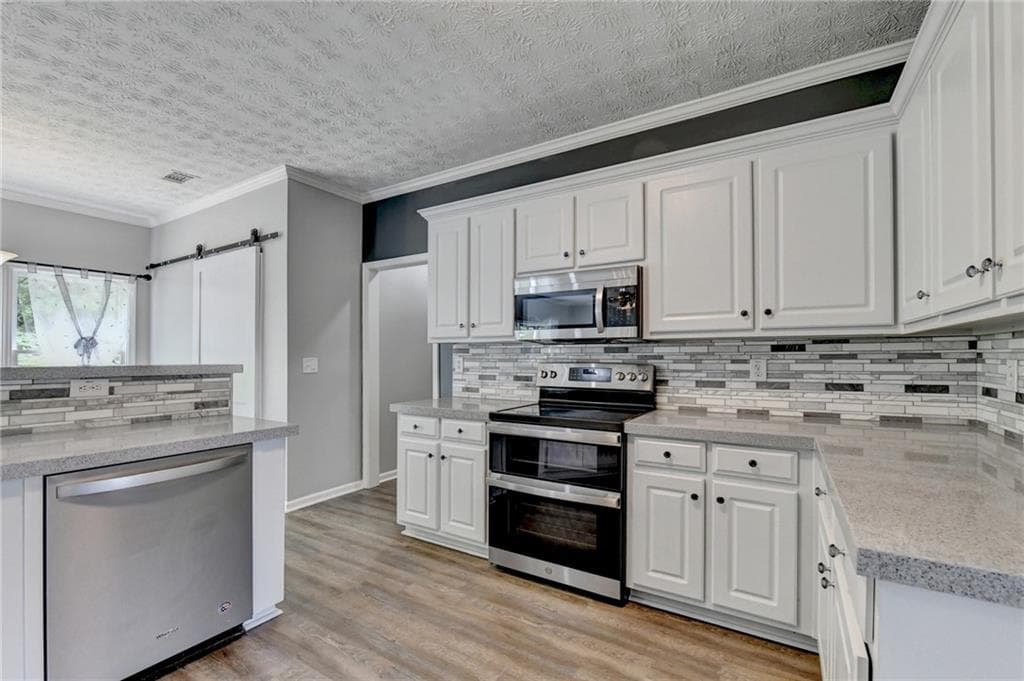 5 bedroom, 3 bathroom, 2,900 sq ft single family residence for sale at 1813 Gold Finch Way, Lawrenceville, GA 30043 — photo 10