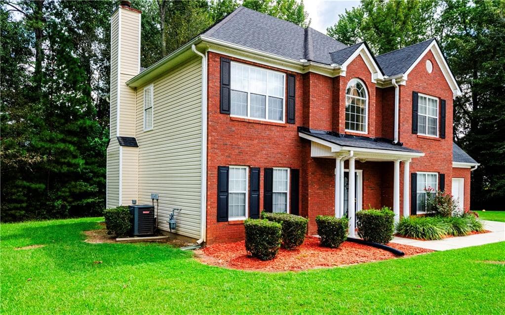 4 bedroom, 3 bathroom, 2,456 sq ft single family residence for sale at 41 Chipping Court, Riverdale, GA 30274 — photo 3