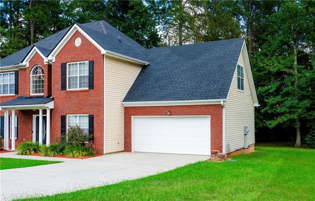 4 bedroom, 3 bathroom, 2,456 sq ft single family residence for sale at 41 Chipping Court, Riverdale, GA 30274 — photo 4