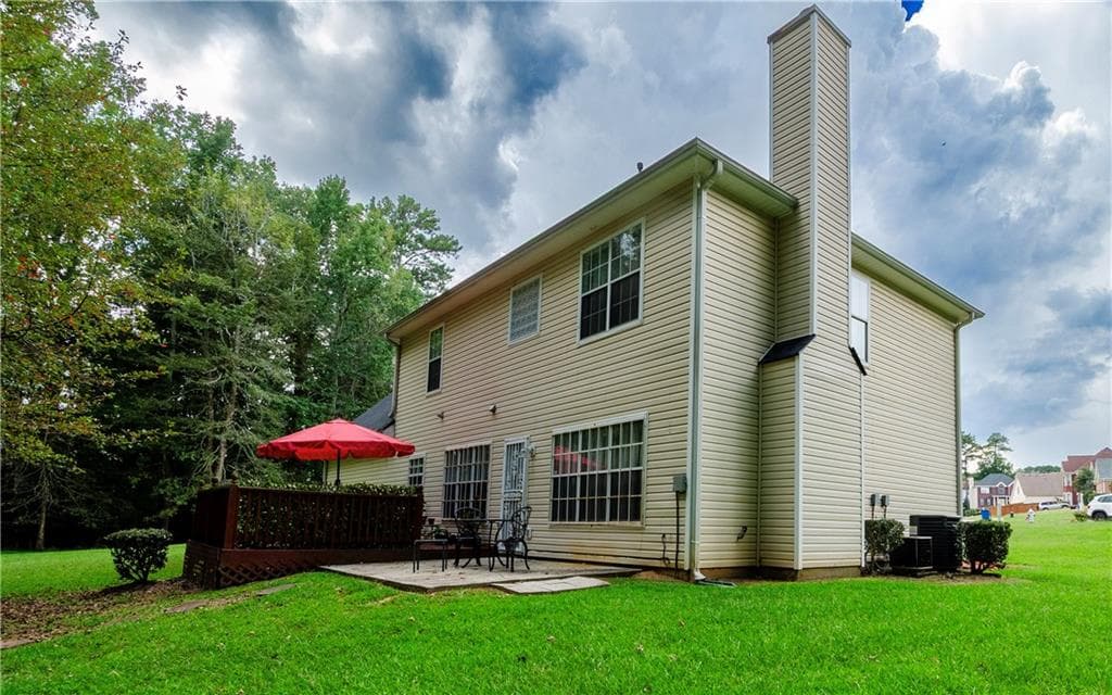 4 bedroom, 3 bathroom, 2,456 sq ft single family residence for sale at 41 Chipping Court, Riverdale, GA 30274 — photo 5