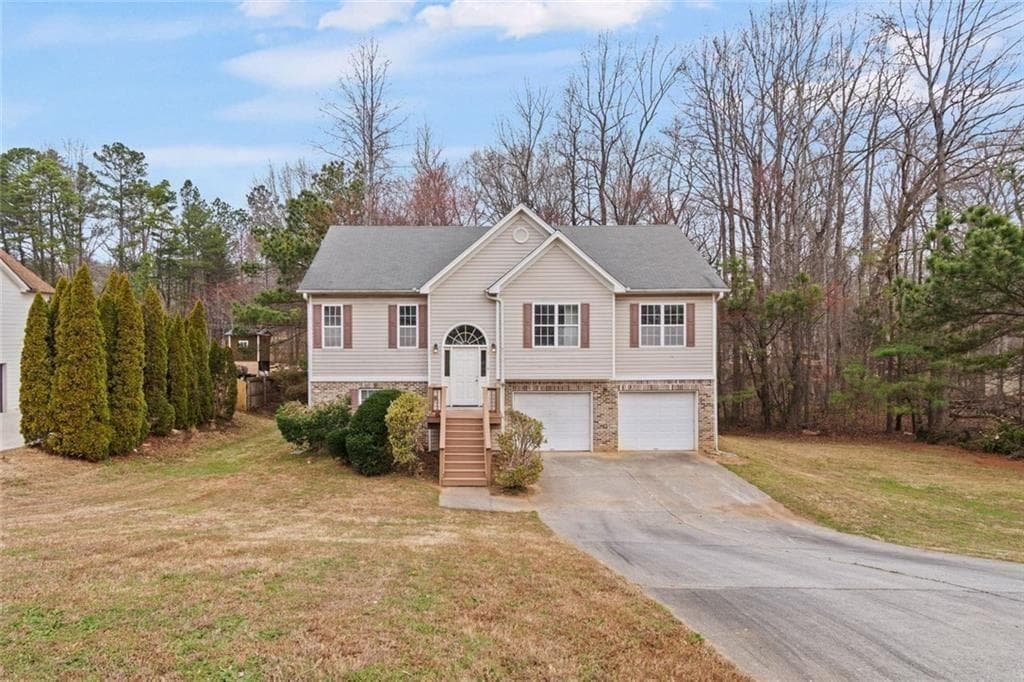 4 bedroom, 3 bathroom, 2,704 sq ft single family residence for sale at 3440 Duncan Bridge Drive, Buford, GA 30519 — photo 2