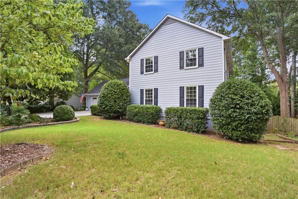 4 bedroom, 3 bathroom, 2,627 sq ft single family residence for sale at 4086 Howell Ferry Road, Duluth, GA 30096 — photo 2
