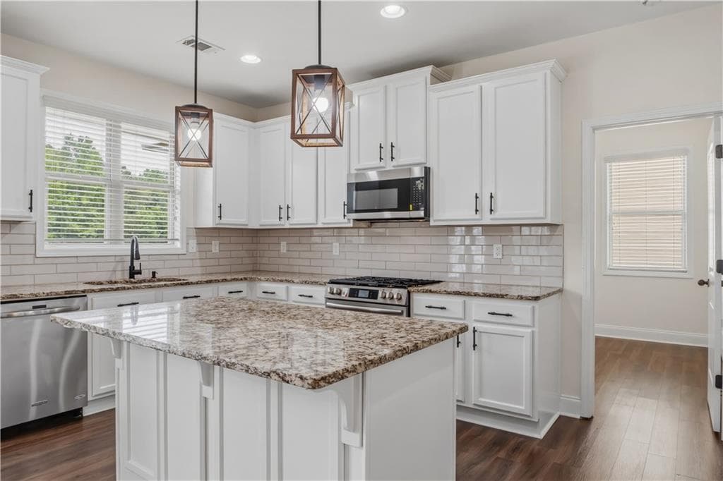 7 bedroom, 4 bathroom, 4,382 sq ft single family residence for sale at 2238 Well Springs Drive, Buford, GA 30519 — photo 10