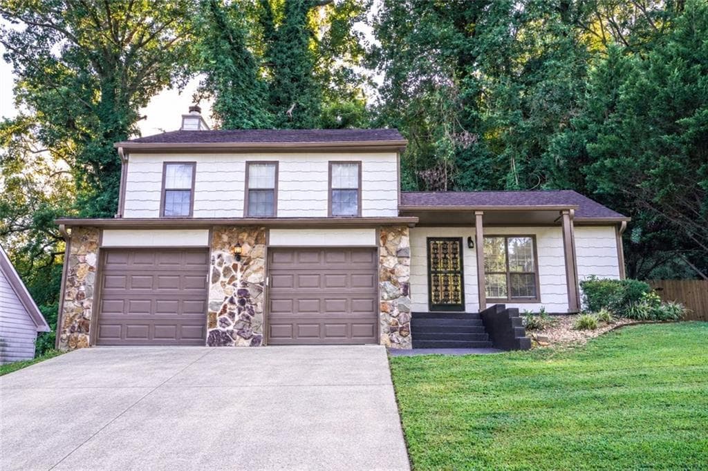 3 bedroom, 2 bathroom, 1,632 sq ft single family residence for sale at 4847 Brasac Drive, Stone Mountain, GA 30083 — photo 2