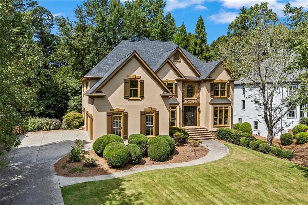 6 bedroom, 5 bathroom, 5,780 sq ft single family residence for sale at 5545 Stoneleigh Drive, Suwanee, GA 30024